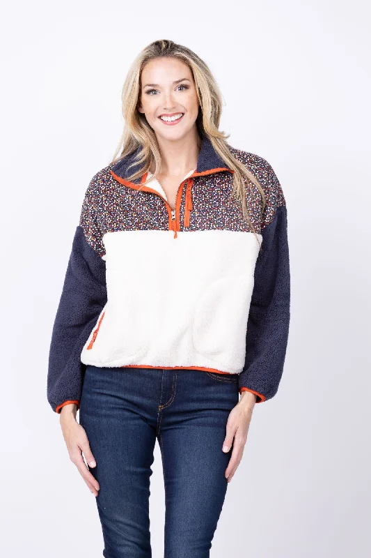 The Great. The Plush Colorblock Terrain Half-Zip Pullover in Mountain View Floral / Chalk Ruffled Neck Pullover The Great. The Plush Colorblock Terrain Half-Zip Pullover in Mountain View Floral / Chalk Ruffled Neck Pullover